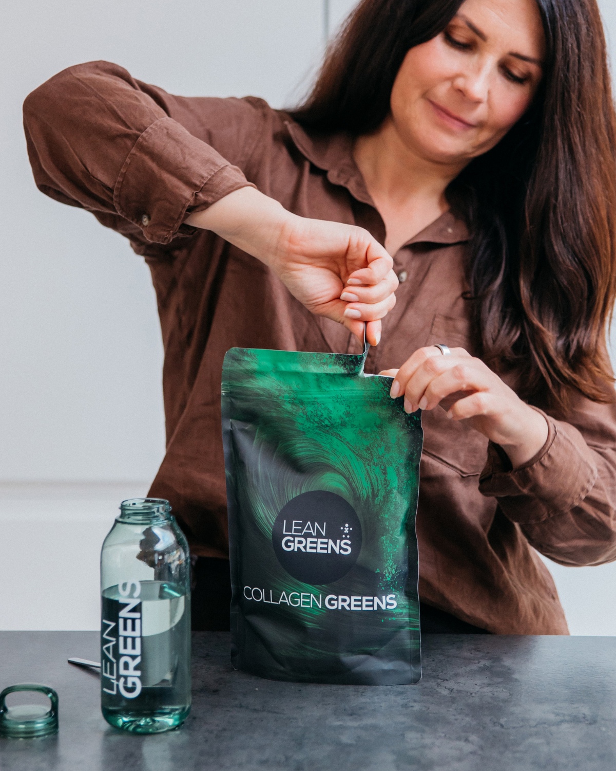 Personal trainer with Collagen Greens